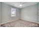 Bright bedroom with neutral walls and carpet flooring at 2866 15Th Avenue Se Pl, Hickory, NC 28602