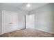 Bedroom with double doors and carpet flooring at 2866 15Th Avenue Se Pl, Hickory, NC 28602