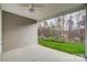 Covered patio with a view of a grassy backyard and trees at 2866 15Th Avenue Se Pl, Hickory, NC 28602