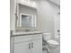 Bathroom with white vanity, granite countertop, and a toilet at 2870 15Th Avenue Se Pl, Hickory, NC 28602