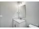 Modern bathroom with white vanity and granite countertop at 2870 15Th Avenue Se Pl, Hickory, NC 28602