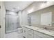 Double vanity bathroom with granite countertop and glass shower at 2870 15Th Avenue Se Pl, Hickory, NC 28602