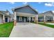 Newly built home with carport and landscaping at 2870 15Th Avenue Se Pl, Hickory, NC 28602