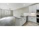 Modern kitchen featuring white shaker cabinets, granite countertops, and stainless steel appliances at 2870 15Th Avenue Se Pl, Hickory, NC 28602