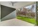 Covered patio with ceiling fan, overlooking a grassy backyard at 2870 15Th Avenue Se Pl, Hickory, NC 28602