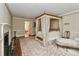 Bedroom featuring a four poster canopy bed and a vintage foot stool at 715 Saint Cloud Dr, Statesville, NC 28625