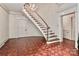 Elegant foyer with a stunning chandelier and hardwood floors at 715 Saint Cloud Dr, Statesville, NC 28625
