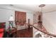 Upstairs landing with spiral staircase, parquet floors, white walls and vintage furnishings at 715 Saint Cloud Dr, Statesville, NC 28625