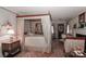 Elegant main bedroom featuring a canopy bed, crown molding, and tasteful decor creating a luxurious retreat at 715 Saint Cloud Dr, Statesville, NC 28625