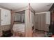 Spacious main bedroom with a canopy bed, soft lighting, and ample closet space offering comfort and functionality at 715 Saint Cloud Dr, Statesville, NC 28625