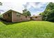 Generous backyard space, ideal for outdoor activities, with a view of the surrounding greenery at 370 21St Nw Ave, Hickory, NC 28601
