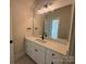 Well-lit bathroom vanity featuring a quartz countertop, sleek faucet, and modern lighting fixtures at 4379 Morning Mist Dr # 12, Sherrills Ford, NC 28673