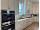 Gourmet kitchen showcasing custom cabinets, modern appliances, and sleek countertops at 4379 Morning Mist Dr # 12, Sherrills Ford, NC 28673