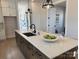 Stylish kitchen island featuring quartz countertops, a modern faucet, and bar stool seating at 4379 Morning Mist Dr # 12, Sherrills Ford, NC 28673