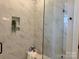 Modern tiled shower with frameless glass enclosure and built-in niche at 4379 Morning Mist Dr # 12, Sherrills Ford, NC 28673