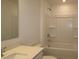 Bathroom with a bathtub, shower, and vanity with a quartz countertop at 4061 Lawnview Dr, Charlotte, NC 28269