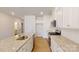 Well-lit kitchen featuring granite counters, stainless appliances, and a kitchen island at 4061 Lawnview Dr, Charlotte, NC 28269