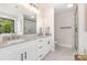 The dual sink bathroom features a large mirror and access to the walk-in shower at 171 Heartland Dr # 7, Rock Hill, SC 29732