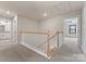 Upstairs hallway with neutral carpet leads to rooms with natural light, showing a clean and well-lit home interior at 171 Heartland Dr # 7, Rock Hill, SC 29732