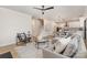 Bright living room featuring modern furnishings, sleek ceiling fan, and an open floor plan with light, airy tones at 171 Heartland Dr # 7, Rock Hill, SC 29732