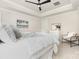A well-lit main bedroom offers calm and relaxation with soft colors and plenty of room at 171 Heartland Dr # 7, Rock Hill, SC 29732