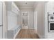 View of mudroom leading to bathroom; has built-in bench, storage cubbies and coat hooks at 171 Heartland Dr # 7, Rock Hill, SC 29732