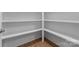 Walk-in pantry with built-in shelves providing ample storage space for kitchen essentials and organizational needs at 171 Heartland Dr # 7, Rock Hill, SC 29732