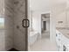 The bathroom's walk-in shower showcases modern fixtures and white marbled tiles for a sleek look at 171 Heartland Dr # 7, Rock Hill, SC 29732