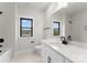 Bright bathroom featuring a tub-shower, toilet, vanity and black hardware accents at 199 Heartland Dr # 10, Rock Hill, SC 29732