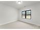 This bedroom offers a large window bringing in plenty of natural light at 199 Heartland Dr # 10, Rock Hill, SC 29732
