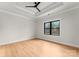 Bedroom with wood floors, modern ceiling fan, tray ceiling, and natural light at 199 Heartland Dr # 10, Rock Hill, SC 29732