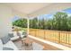 A covered deck with outdoor furniture offering a serene view at 199 Heartland Dr # 10, Rock Hill, SC 29732