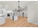 Open floor plan view of kitchen island, stainless appliances and recessed lighting at 199 Heartland Dr # 10, Rock Hill, SC 29732