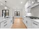 Modern kitchen with island, stainless appliances and beautiful lighting and countertops at 199 Heartland Dr # 10, Rock Hill, SC 29732