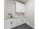 Laundry room featuring shaker cabinets and quartz countertops at 199 Heartland Dr # 10, Rock Hill, SC 29732