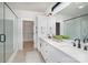 The main bathroom has dual sinks, granite countertop, walk-in closet, and glass enclosed shower at 199 Heartland Dr # 10, Rock Hill, SC 29732