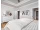 A well-lit bedroom showcases decor items and artwork to complement the neutral tones at 199 Heartland Dr # 10, Rock Hill, SC 29732