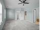 Large bedroom with neutral walls, carpeted floor, and walk-in closet with multiple entrances at 9341 Lenox Pointe Dr, Charlotte, NC 28273