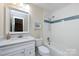 Full bathroom with a shower-tub combination, single sink vanity, white cabinets, and modern fixtures at 430 Queens Rd # 712, Charlotte, NC 28207