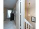 Hallway view with a partial view of stairs, lighting fixture and dresser at 430 Queens Rd # 712, Charlotte, NC 28207