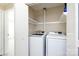 Laundry room featuring a modern washer and dryer, as well as built in shelving at 430 Queens Rd # 712, Charlotte, NC 28207