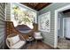 Inviting patio featuring wicker chairs, a small table, and an exterior lattice wall at 430 Queens Rd # 712, Charlotte, NC 28207