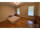 Bedroom with hardwood floors and window at 475 Cornerstone Dr, Taylorsville, NC 28681