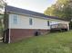 Back of house showing deck and large yard at 475 Cornerstone Dr, Taylorsville, NC 28681