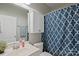 Clean bathroom with a shower/tub combo and patterned curtain at 125 Ariel Dr, Mooresville, NC 28117