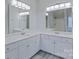 Double vanity bathroom with modern finishes and a large mirror at 125 Ariel Dr, Mooresville, NC 28117