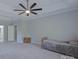 Large bedroom with ceiling fan and ample space at 125 Ariel Dr, Mooresville, NC 28117