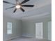 Spacious bedroom featuring a ceiling fan and access to a bathroom at 125 Ariel Dr, Mooresville, NC 28117