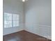 Formal dining room with wainscoting and hardwood floors at 125 Ariel Dr, Mooresville, NC 28117