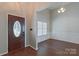 Bright entryway with hardwood floors and access to formal dining area at 125 Ariel Dr, Mooresville, NC 28117